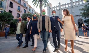 La ministra de Trabajo y Economía Social, Yolanda Díaz (d), el ministro de Inclusión, Seguridad Social y Migraciones, José Luis Escrivá (2i), la presidenta de Baleares, Francina Armengol (3i) y los secretarios generales de UGT, Pepe Álvarez (i) y de CCOO,