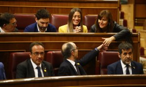 Els exdiputats de JxCat Jordi Sànchez, Jordi Turull i Josep Rull, asseguts als escons del Congrés dels Diputats durant la sessió constitutiva del 21 de maig del 2019.