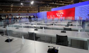 Vista de la sala de prensa en el Centro de Procesamiento y Difusión de Datos, que se ha instalado en Ifema, este lunes, en la víspera de celebración de los comicios en la Comunidad de Madrid.