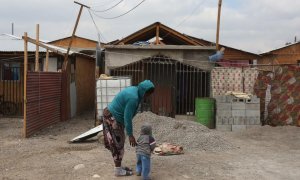 Una mujer haitiana y su hijo rumbo a Norteamérica.