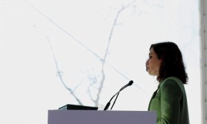 La presidenta de la Comunidad de Madrid, Isabel Díaz Ayuso, durante su intervención en la inauguracón de la mayor electrolinera de carga rápida en España para vehículos eléctricos, este martes en Pozuelo
