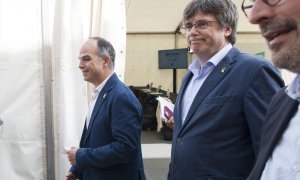 El expresidente de la Generalitat Carles Puigdemont y el exconseller Jordi Turull llegan al Congreso de Junts, a 4 de junio de 2022