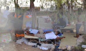 10/07/2022-Migrantes en el centro de recepción de Lampedusa el 10 de julio