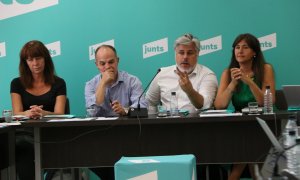 D'esquerra a dreta, Marta Madrenas, Jordi Turull, Albert Batet i Laura Borràs a Girona.