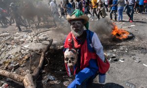 Haitianos participan de una protesta en rechazo a la intervención militar extranjera y en demanda de la renuncia del Primer Ministro Ariel Henry, en Puerto Príncipe (Haití).