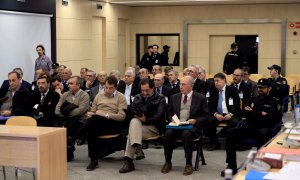 Fotografía de noviembre de 2018 de Rodrigo Rato, expresidente de Bankia, junto al resto de los procesados, en la primera sesión del juicio en la Audiencia Nacional por la salida a Bolsa de la entidad en julio de 2011.