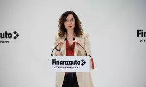 La presidenta de la Comunidad de Madrid, Isabel Díaz Ayuso, interviene durante su visita a las instalaciones de Finanzauto, a 18 de marzo de 2024, en Arganda del Rey, Madrid (España).