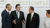Rajoy se asoma a la cumbre del clima a hacerse la foto y se va