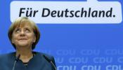 Merkel dice que no cambiará su política europea y que ya habla con el SPD