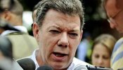 Santos promete continuar la "obra inmensa" de Uribe en Colombia