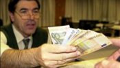 El euro sube hasta 1,4465 dólares en la apertura