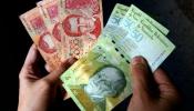 Los venezolanos empiezan el 2008 con una nueva moneda, el bolívar fuerte