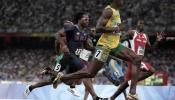 Bolt destroza el récord del mundo y Powell vuelve a fracasar