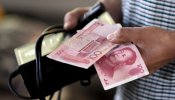 China devalúa aún más el yuan y agita el temor a una guerra de divisas