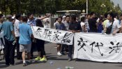 Los afectados por la explosión de Tianjin protestan contra el Gobierno por su abandono