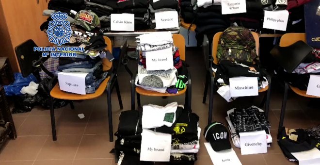 Detenido tras desmantelar un punto de venta con más de 1.500 prendas de ropa falsificada