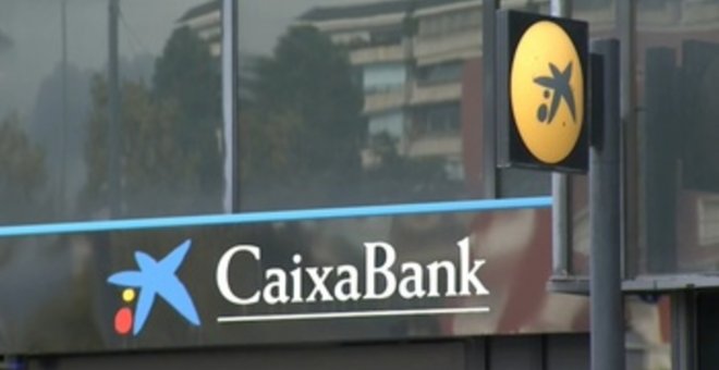 CaixaBank gana casi 4 veces más por la fusión y planea elevar el dividendo