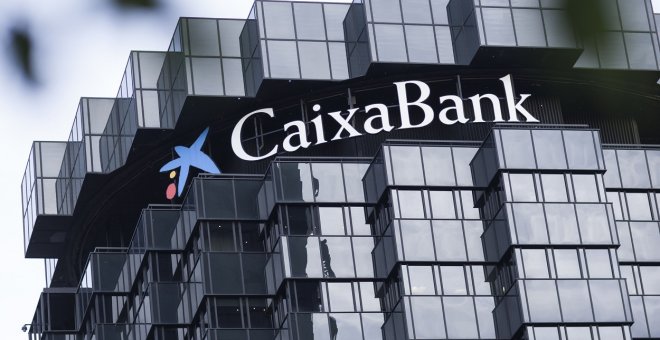 CaixaBank gana casi cuatro veces más en 2021 tras la fusión con Bankia