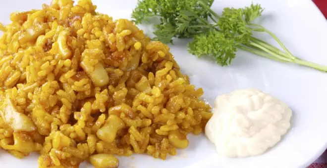 Pato confinado - Receta de arroz al azafrán con calamar y pescado