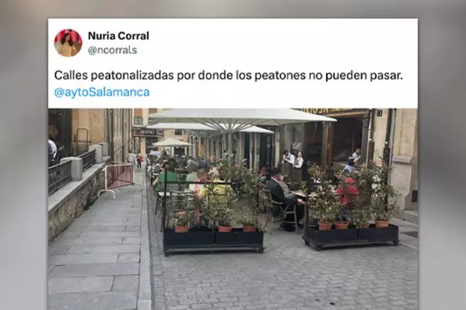 Imagen de una calle de Salamanca ocupada por una terraza.